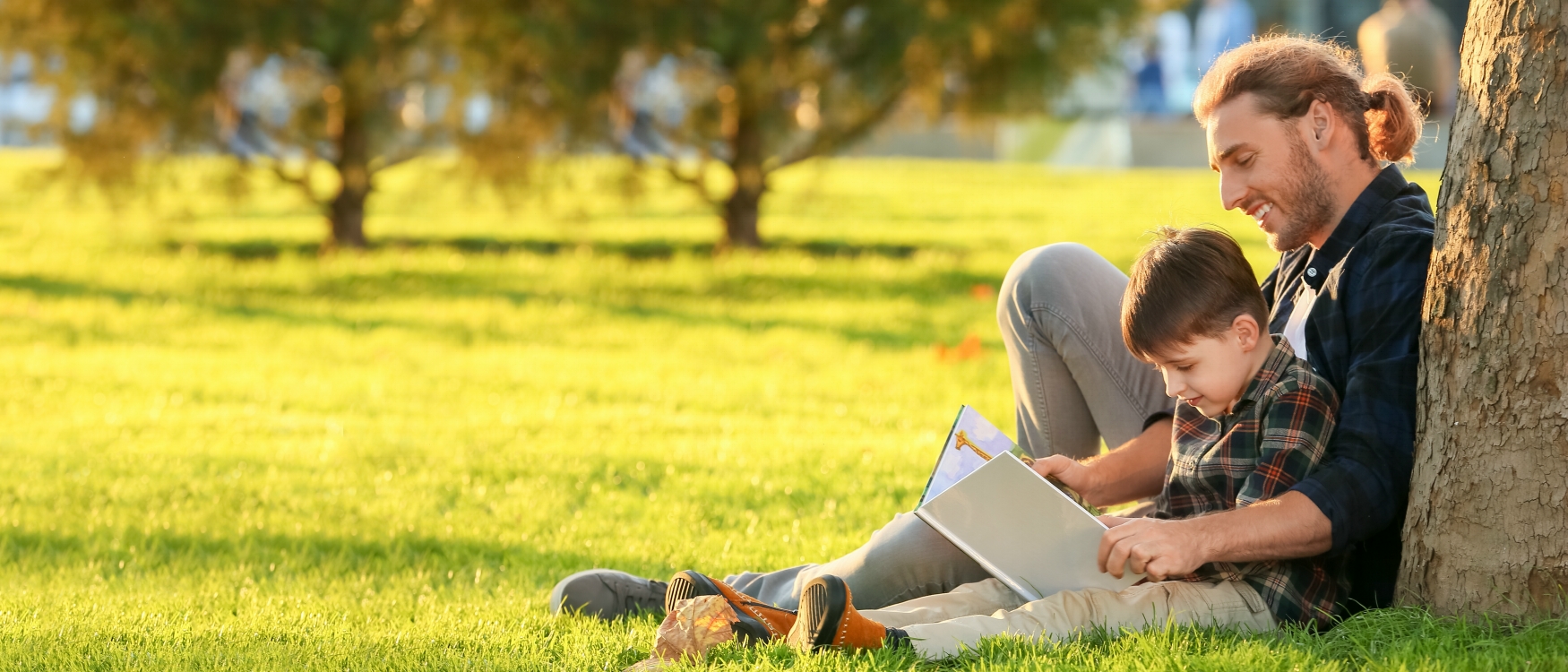 Father and son reading - Double Literacy